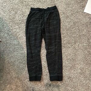 Black joggers. Size medium. Waist band. Fitted ankle.
